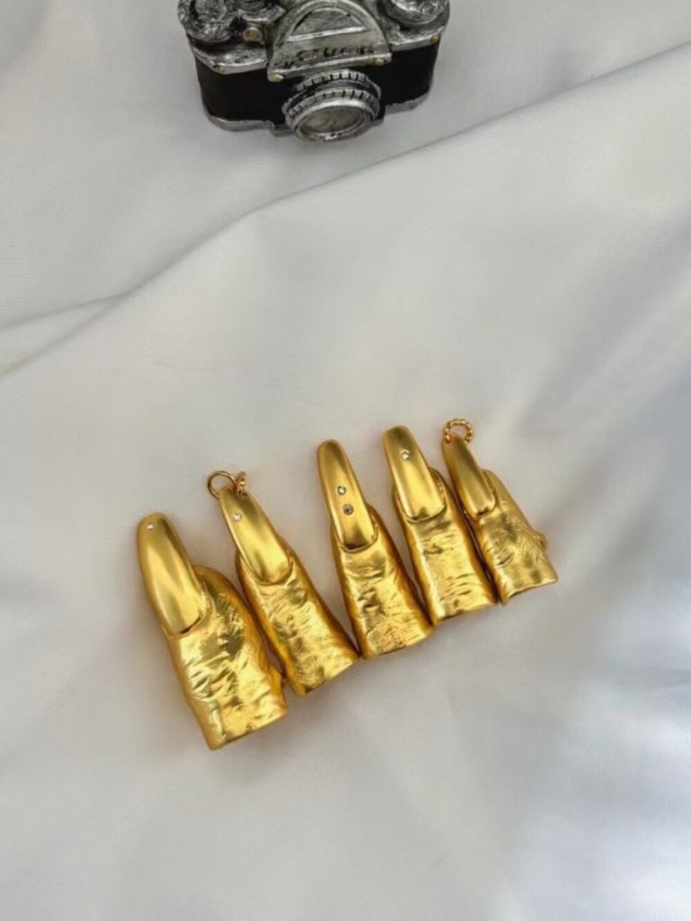 Schiaparelli five-finger open-ring set
